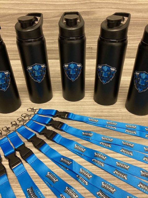 Black insulated water bottles and blue lanyards printed with a Bison team logo