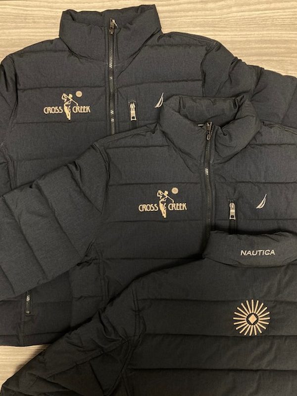Black quilted Nautica jackets embroidered with the Cross Creek golf club logo